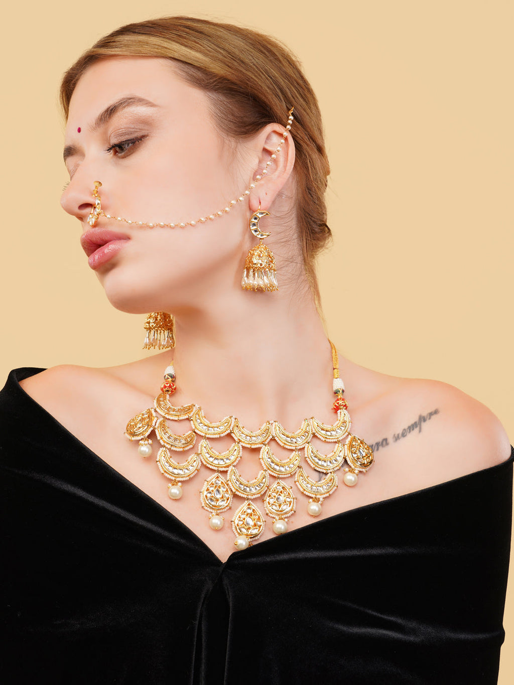 AIVY LUXE gold-tone Indian bridal jewelry set necklace with intricate detailing and matching earrings