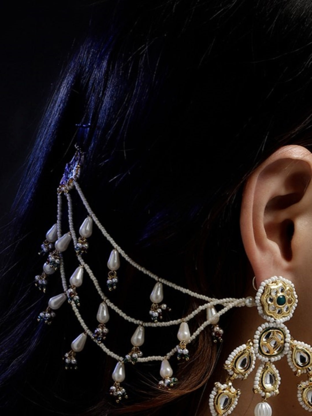 AIVY LUXE Laal-e-Falak statement earrings with intricate pearl and bead design attached to ear with multiple chains