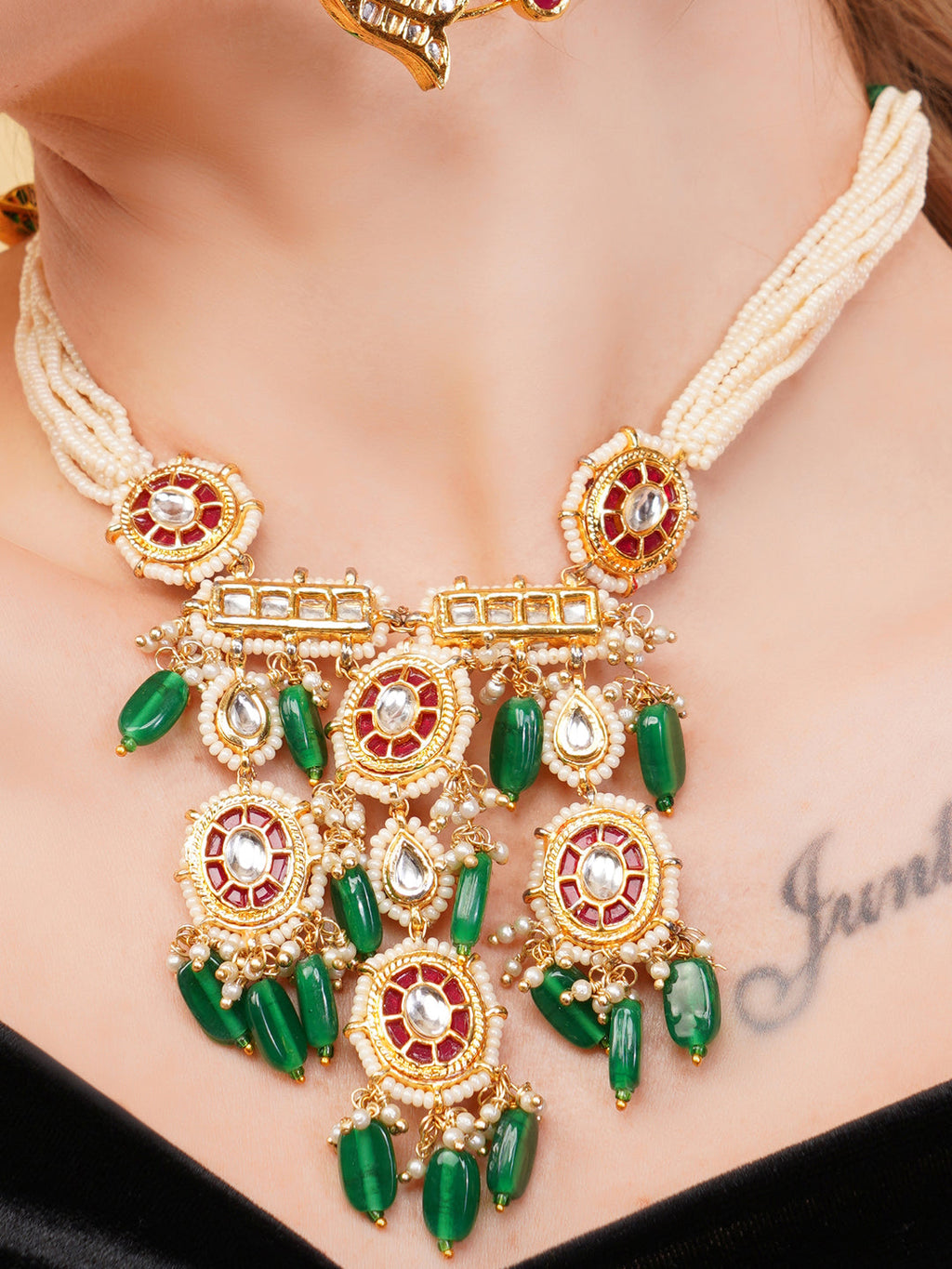 AIVY LUXE luxury ethnic gemstone necklace with red and green stones and intricate gold detailing