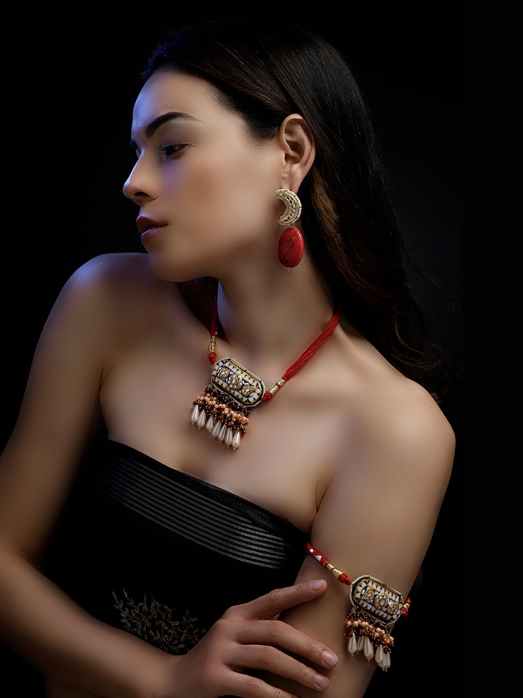 AIVY LUXE luxury ethnic necklace for women with intricate bead and shell detailing worn by model