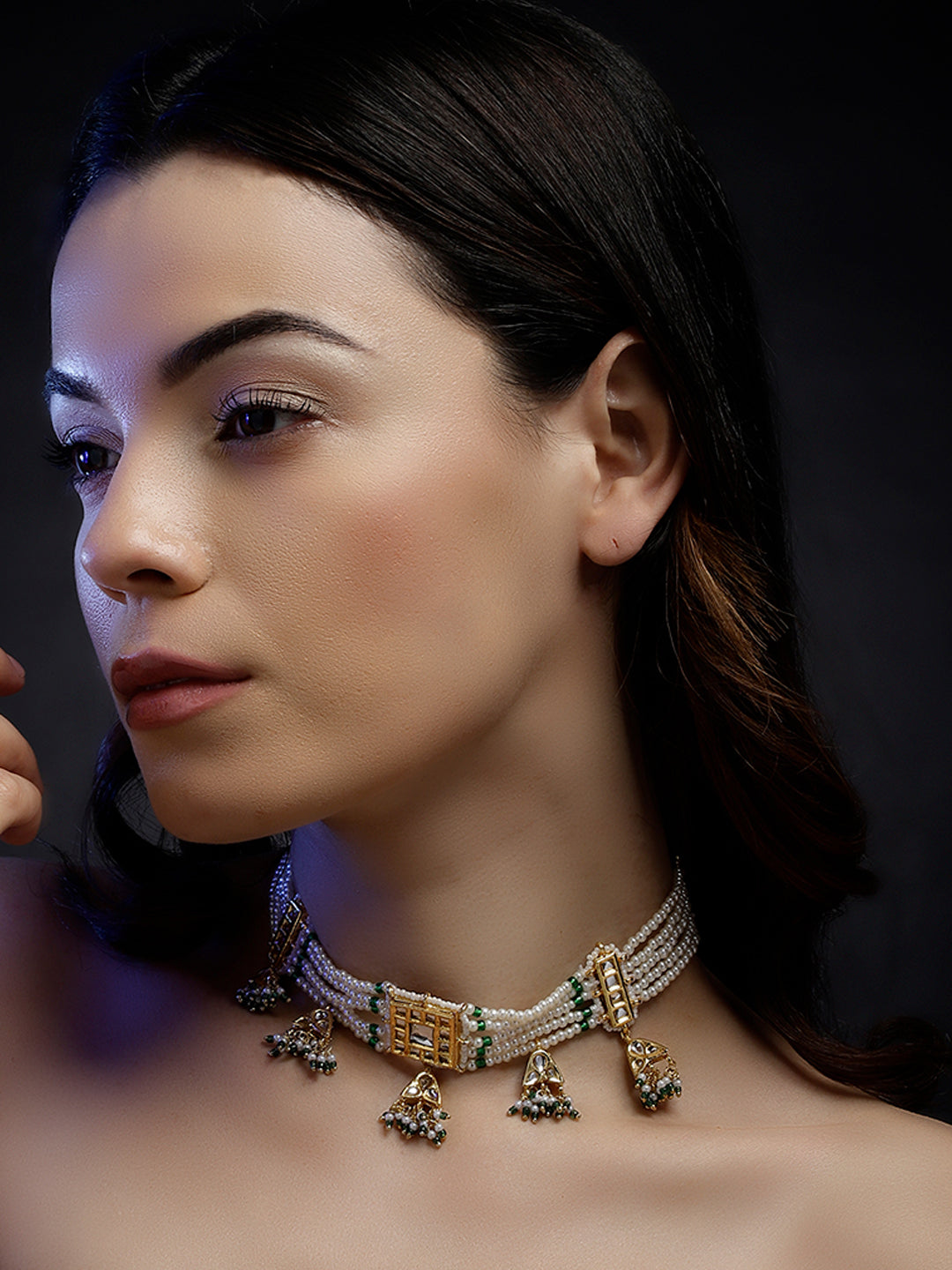 AIVY LUXE luxury pearl choker necklace with intricate gold and green accents worn by woman