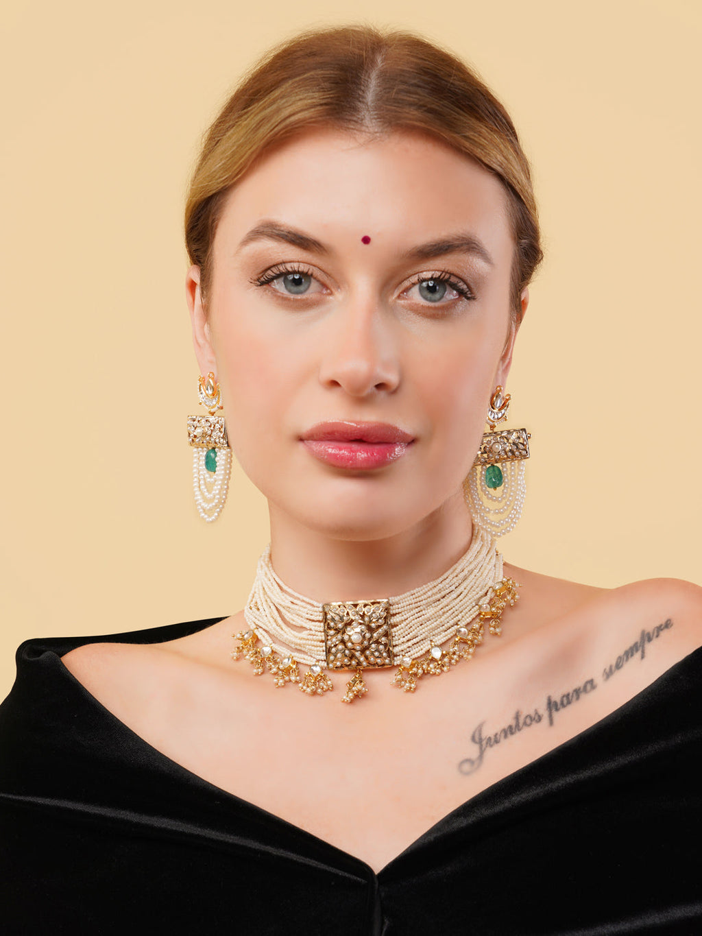 AIVY LUXE pearl choker with gold detailing worn by model with matching earrings and black off-shoulder top