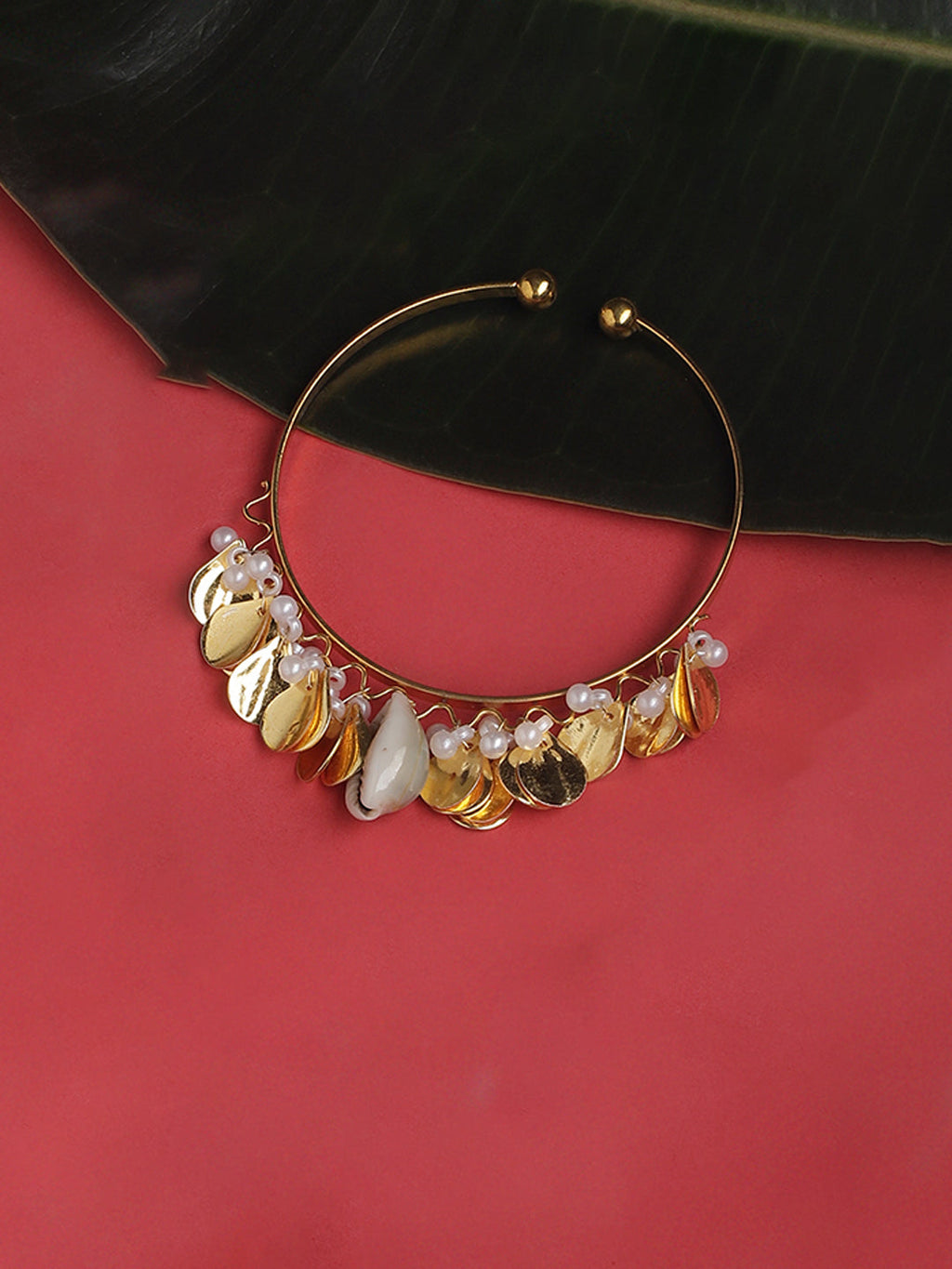 AIVY LUXE premium designer bracelets for women featuring gold tone charms and white pearls on an open cuff