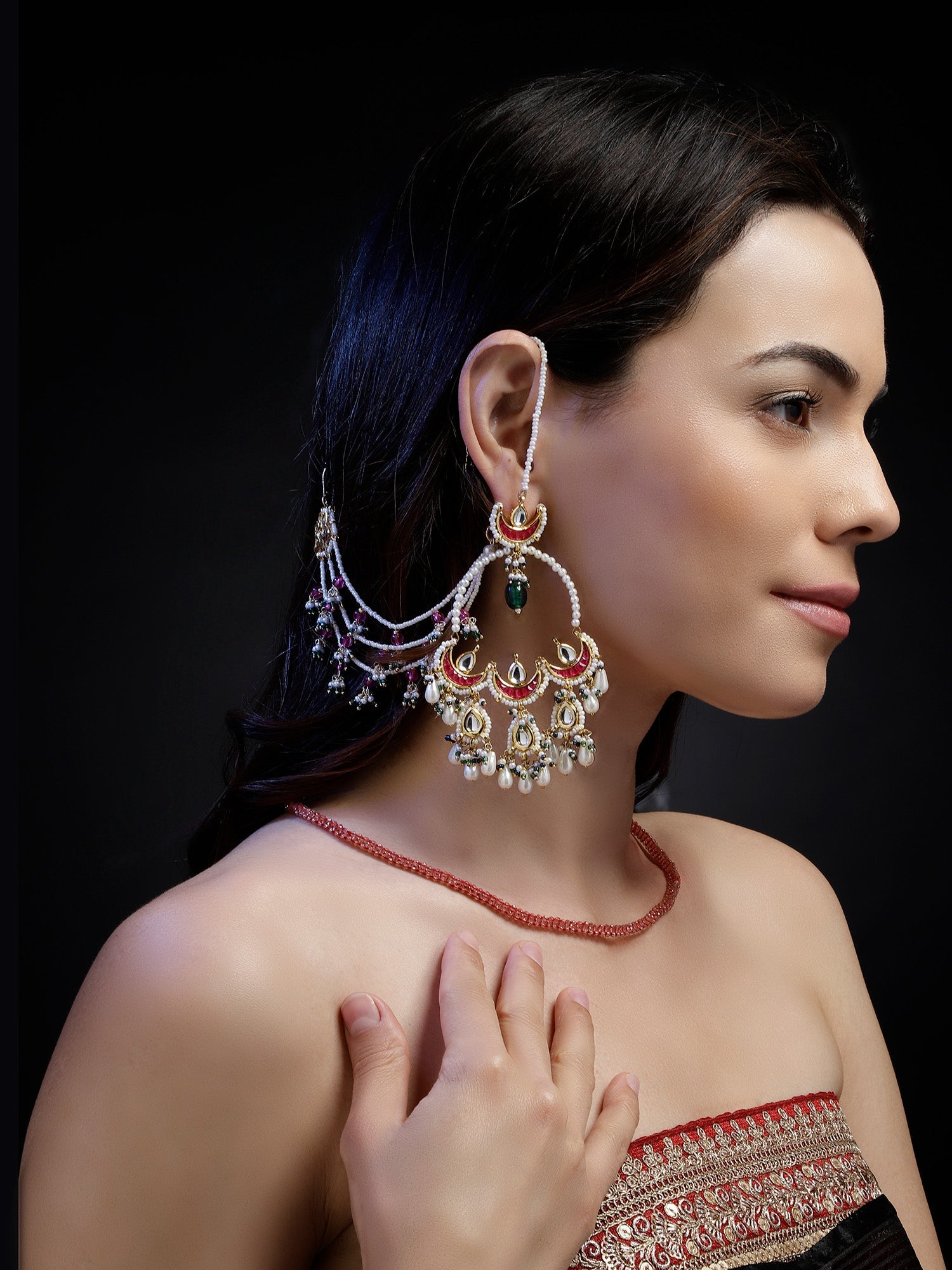 AIVY LUXE Rang-e-Shabnam designer earrings worn by woman with intricate pearl and gemstone details