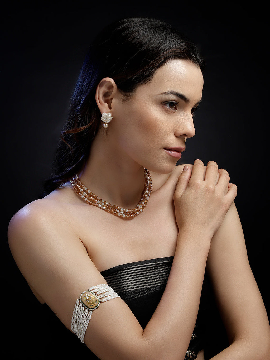 Elegant woman wearing AIVY LUXE Roshni-e-Chandni statement earrings with pearl and gold detailing