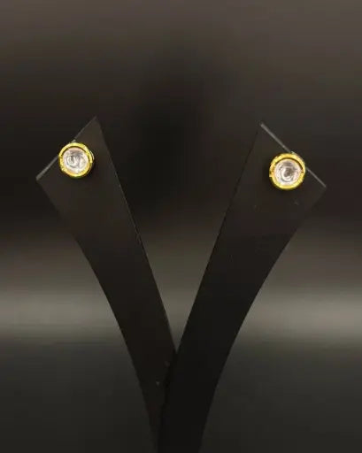 AIVY LUXE ruby pearl cluster earrings with gold-tone settings displayed on black earring stand