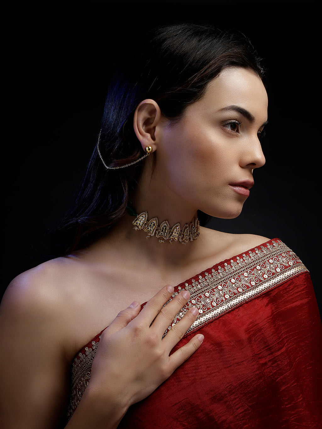 AIVY LUXE Sabz-e-Roshni statement jewelry gold necklace worn by woman in traditional red attire