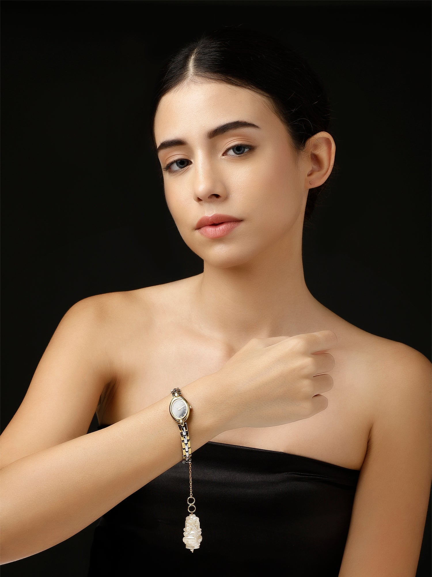 Woman wearing AIVY LUXE Shaandar Zar luxury charm watch charm with elegant design