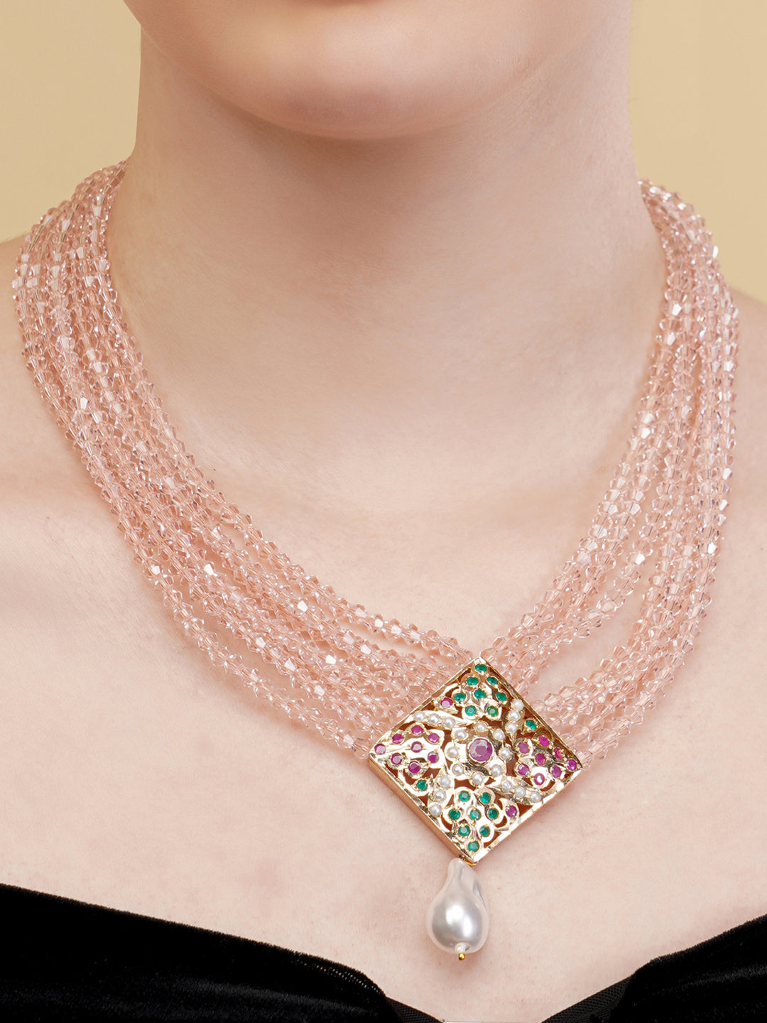 AIVY LUXE statement pearl necklace with multiple strands of pink beads and a jeweled pendant with a dangling pearl