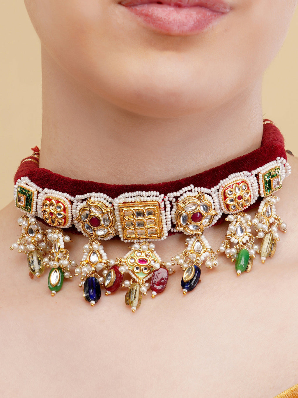 AIVY LUXE traditional Indian choker jewelry with intricate gold designs, colorful gemstones, and pearl accents
