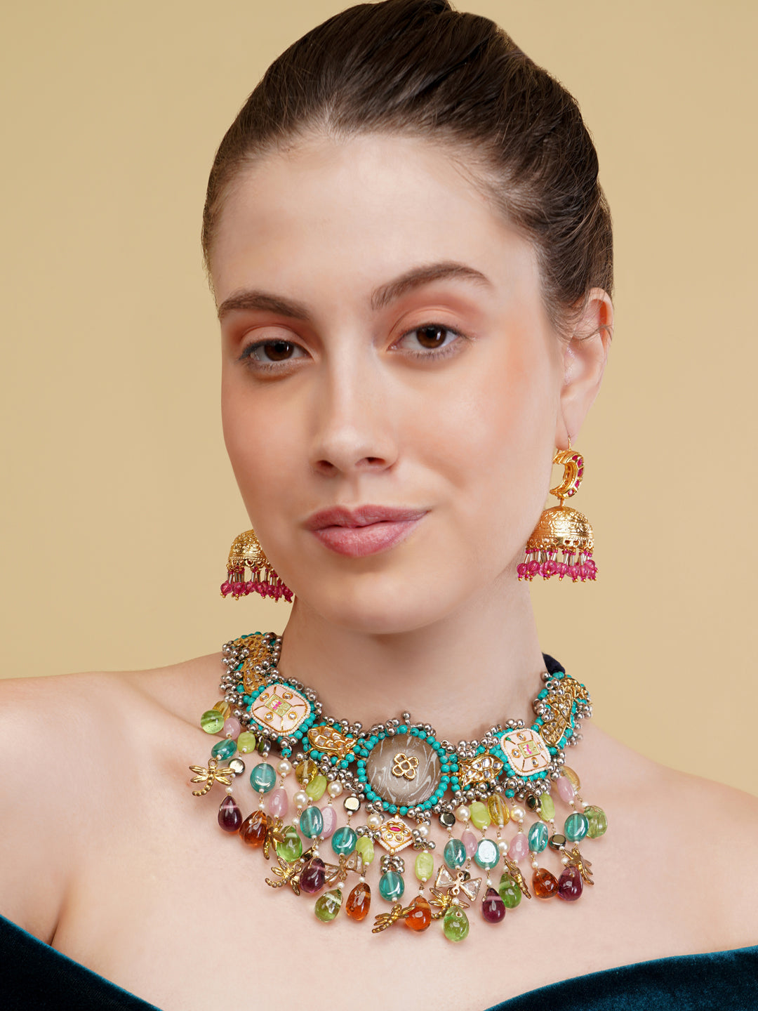 AIVY LUXE colorful gemstone statement necklace with multicolored stones worn by woman