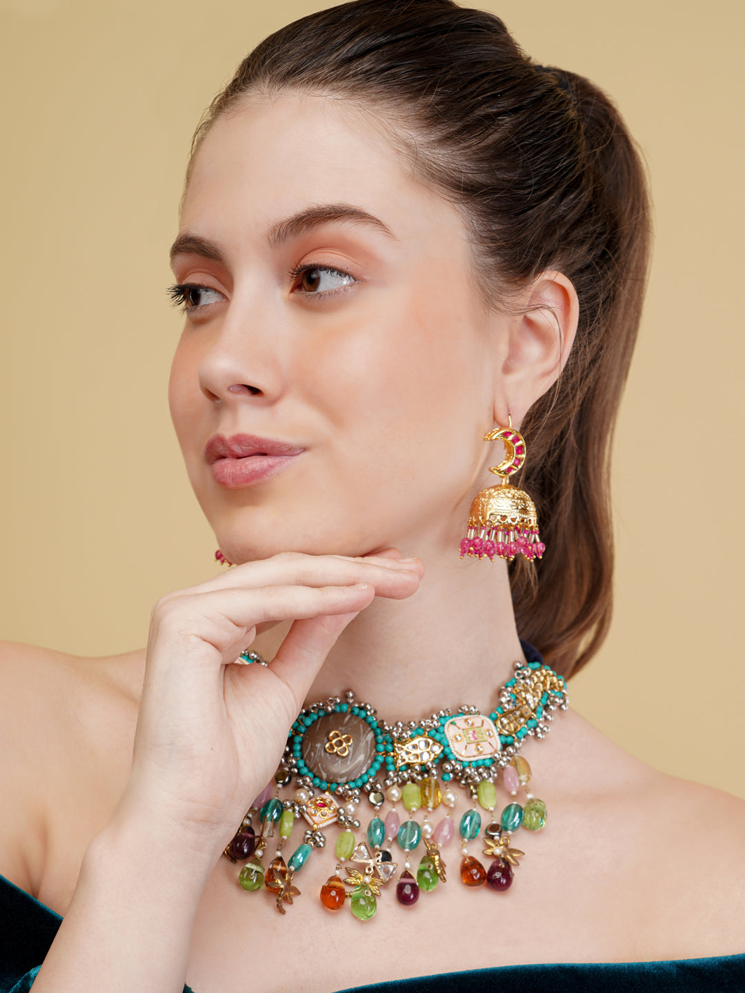 AIVY LUXE colorful gemstone statement necklace with vibrant multi-colored stones worn by a woman