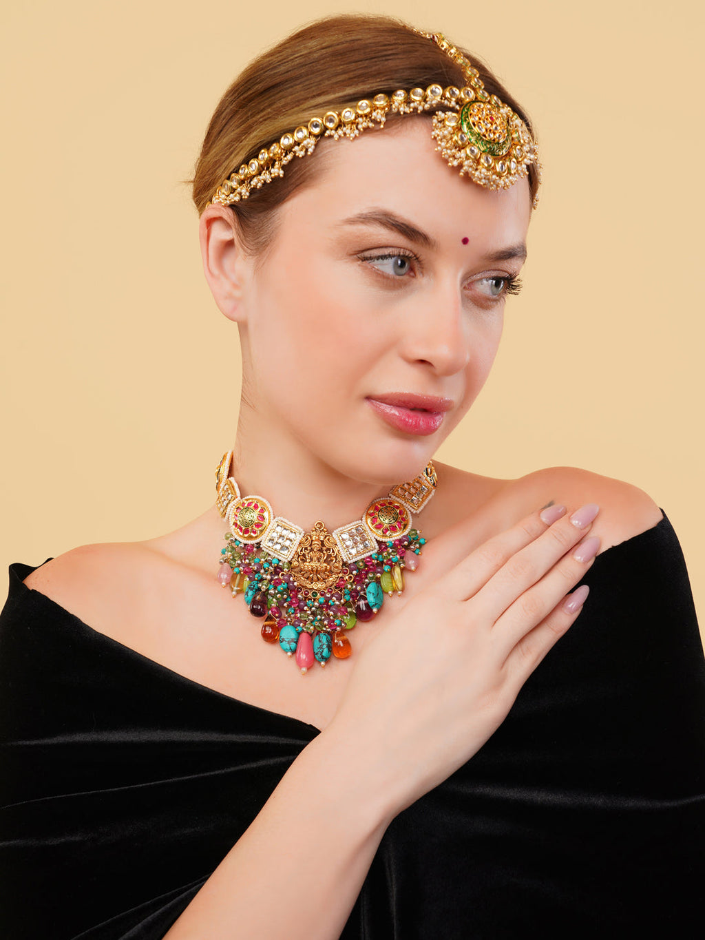 Colourful authentic Indian necklace by AIVY LUXE worn with traditional head jewelry on woman in black outfit