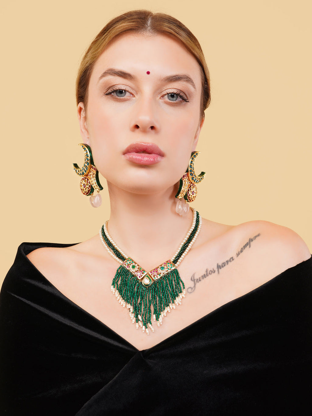 AIVY LUXE emerald pearl stone Indian drop earrings worn by woman with matching green necklace