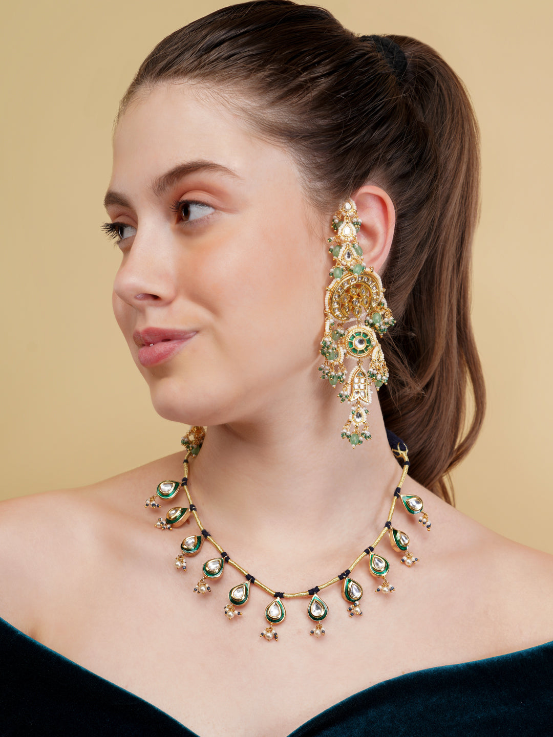 AIVY LUXE luxury Indian necklace for women with green and gold intricate design worn by model