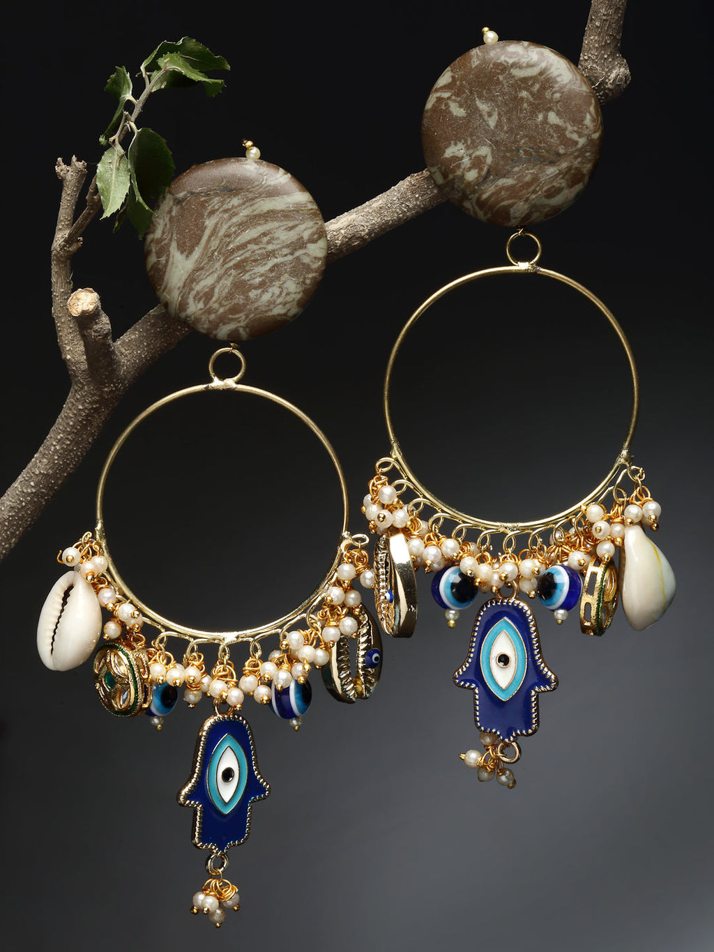 AIVY LUXE shamrock chand bala earrings with gold hoops, blue hamsa charms, beads, and shell accents