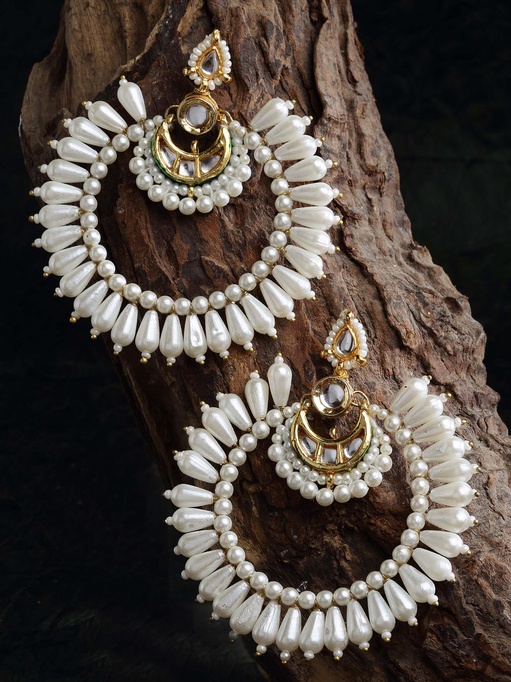 AIVY LUXE Zard Gulab Chand Bala earrings with pearl and gold detailing on rustic wood